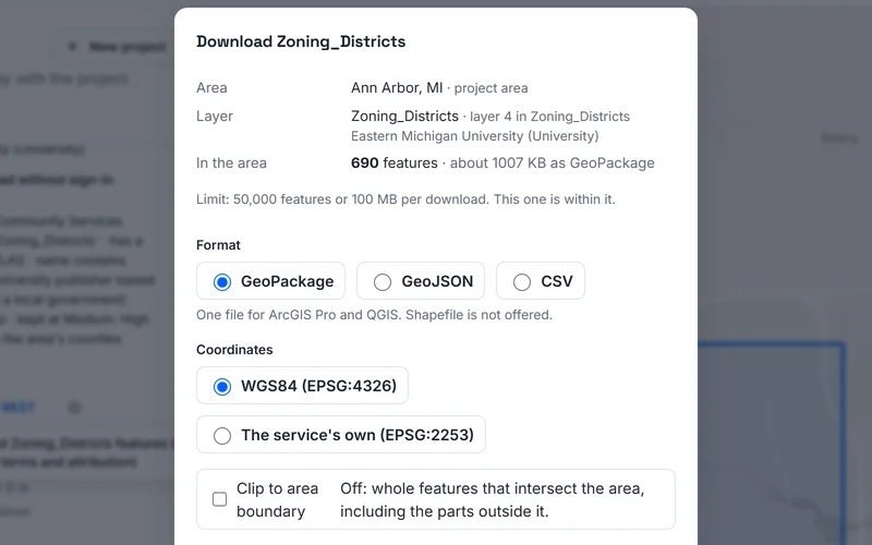 The Download Zoning_Districts dialog for Ann Arbor, Michigan: the layer and its publisher, Eastern Michigan University, 690 features in the area, a choice of GeoPackage, GeoJSON or CSV, the coordinate system and the clip-to-area-boundary option.