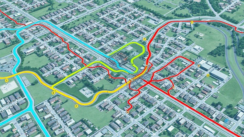 A neighborhood map with color-coded water, sewer, gas, and electric network lines
