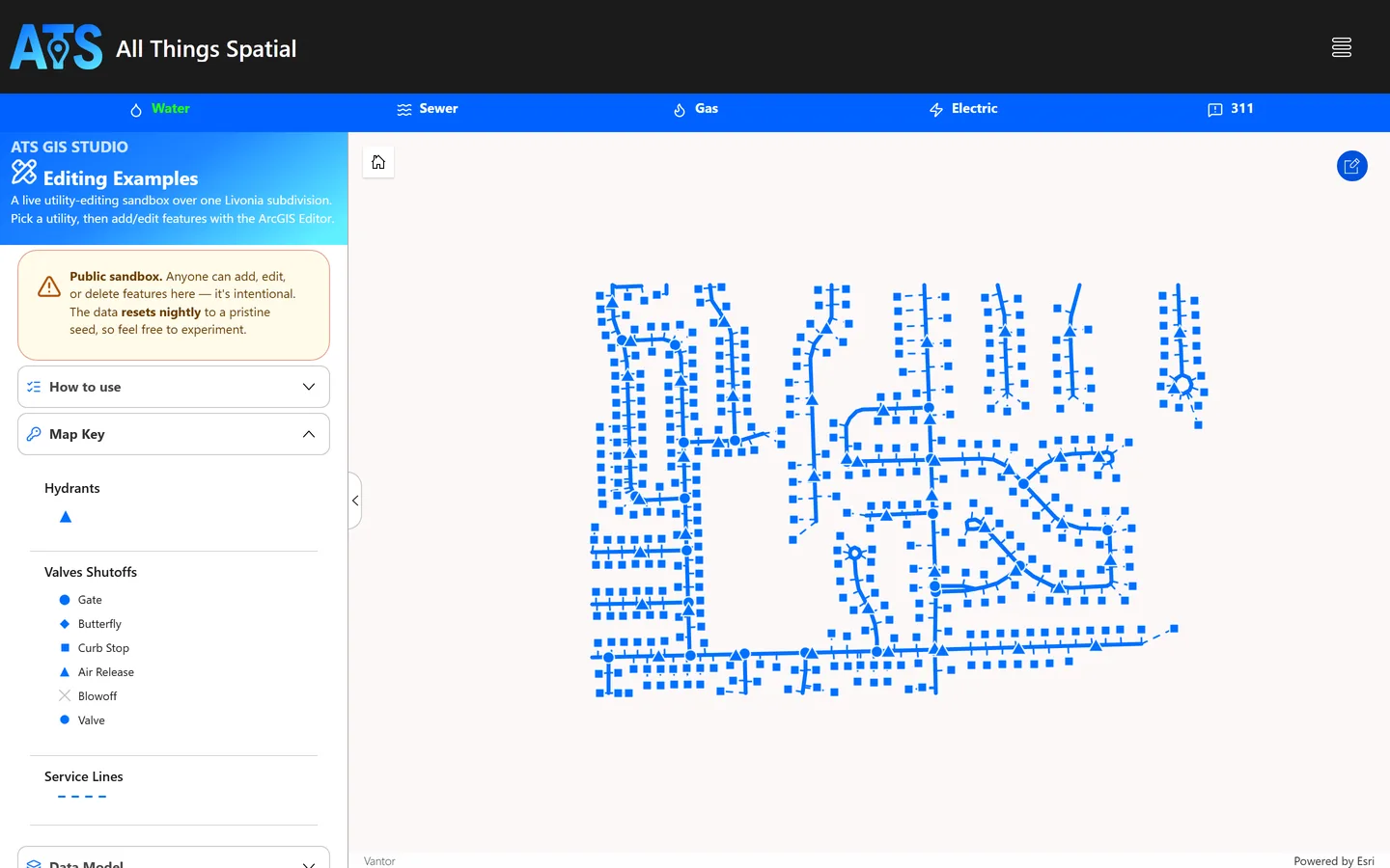 The Experience Builder build on the Editing page, showing the water web map with Esri's native Edit widget.